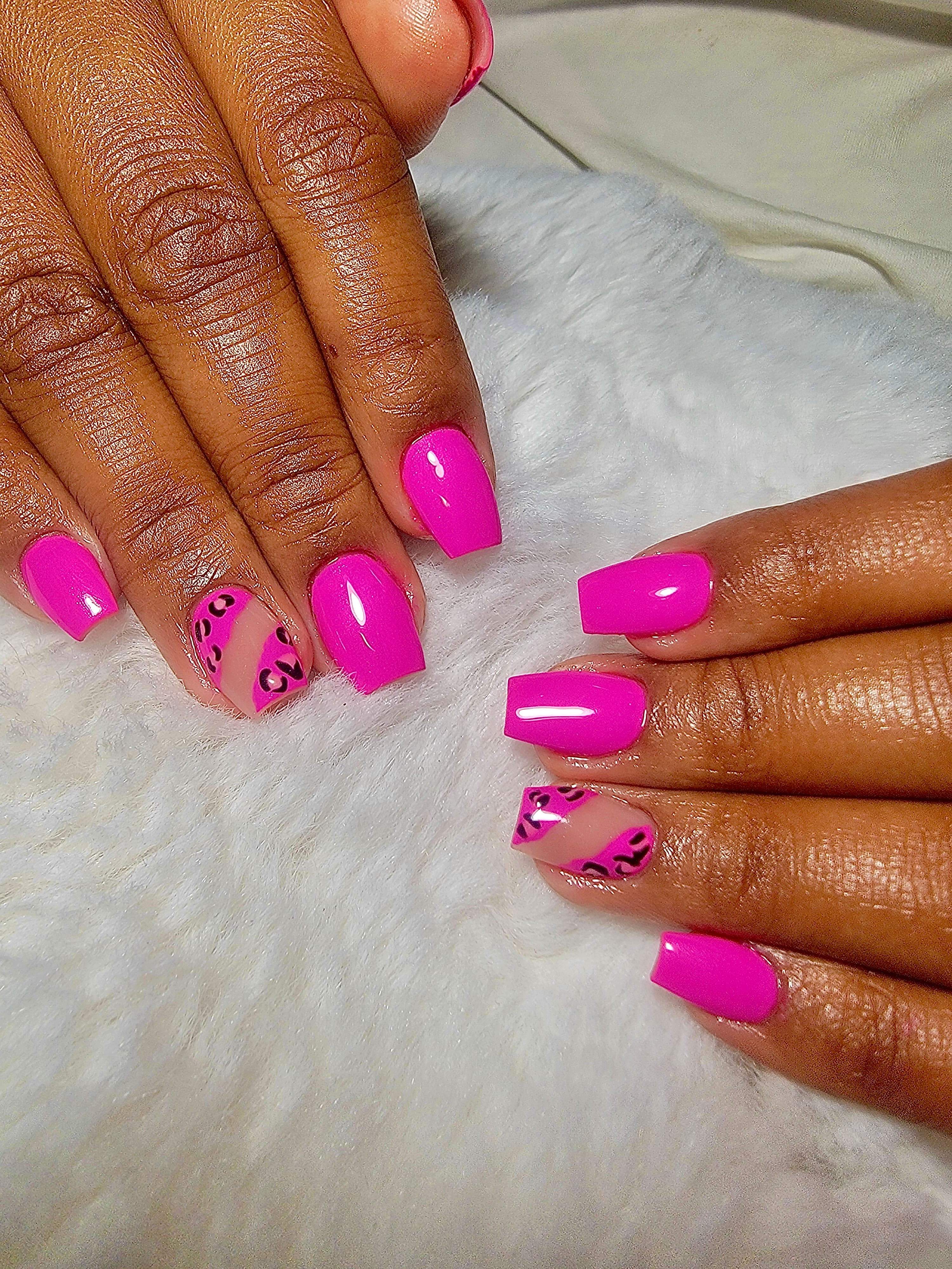 Hot Pink Leopard Both Hands — Gel manicures, pedicures, nail art & extensions at Qasr Alshar Salon, Dubai — near Union Metro, Deira.
